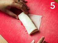 Popiah almost done rolling Popiah almost done rolling